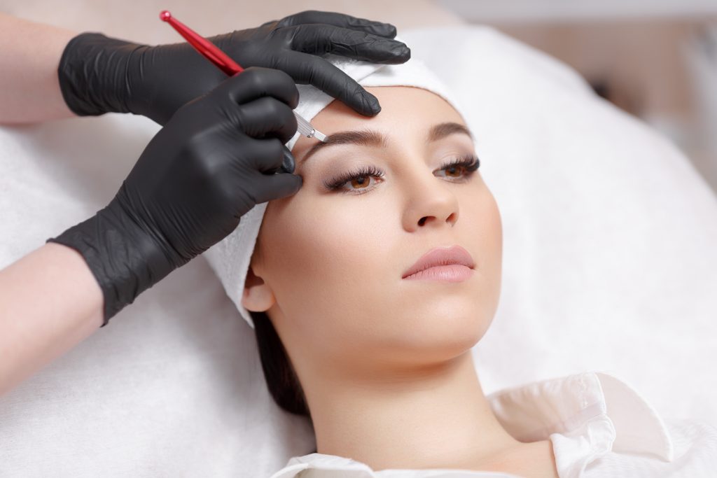 Permanent makeup eyebrows.